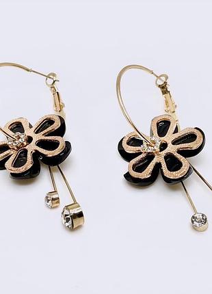 Стильні ефектні золотисті жіночі сережки кульчики підвіси квіти квітки