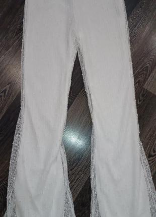 Красиві нарядні білі штани жіночі брюки клеш кльош