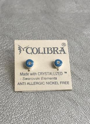 Сережки  colibra із медичного сплаву с кристалами та голубою емаллю