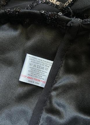 Черная мини-юбка с пайетками и топ костюм в пайетках