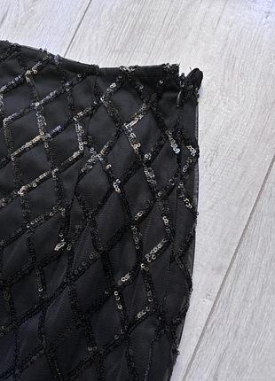 Черная мини-юбка с пайетками и топ костюм в пайетках