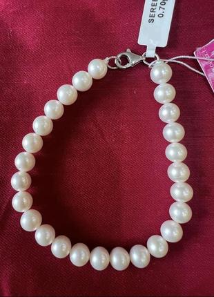 Браслет з білих природніх перлин зі срібною застібкою