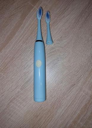Зубна щітка електрична блакитна2 фото