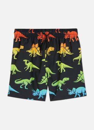 Детские пляжные черные шорты с принтом динозавров primark