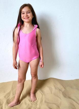 Дитячий рожевий купальник на зав'язках із блискучим ефектом