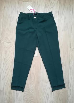 Класичні вкорочені зелені брюки