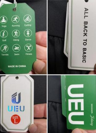 Ueu спортивні еластичні штани на високій посадці, з кишенями та розрізами на штанинах5 фото