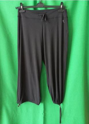 Domyos укороченные спортивные тонкие эластичные брюки с затяжками