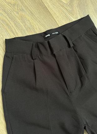 Темно-коричневые брюки
