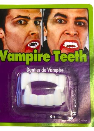 Зуби вампіра білі на блістері