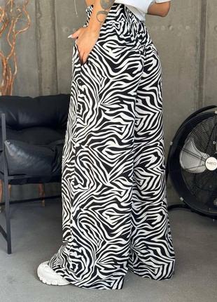 Жіночі чорно-білі якісні літні штани брюки палаццо штапель зебра