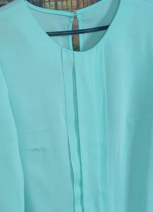 Женская блуза нежно бирюзового цвета