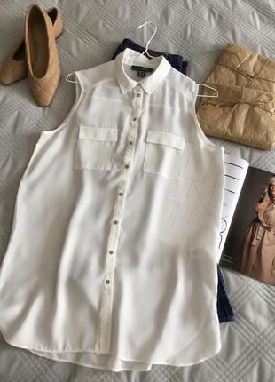 Шифоновая блуза удлинённого кроя с накладными карманами
