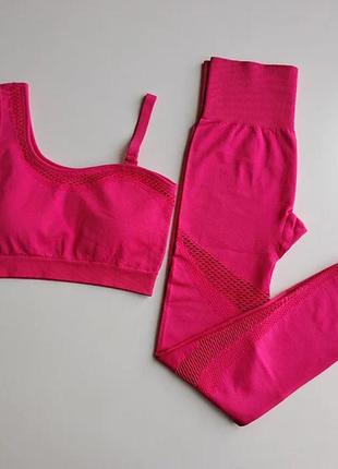 Спортивний костюм з перфорацією без пуш-ап (топ та легінси) рожевого кольору, розмір m
