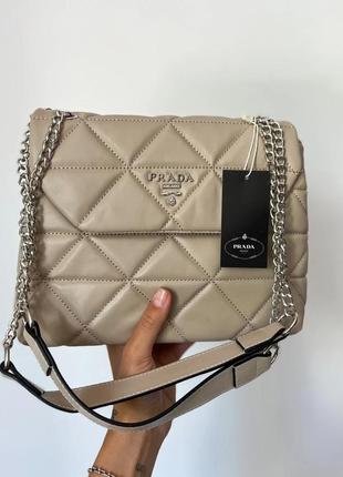 Prada beige triangle  gi5111