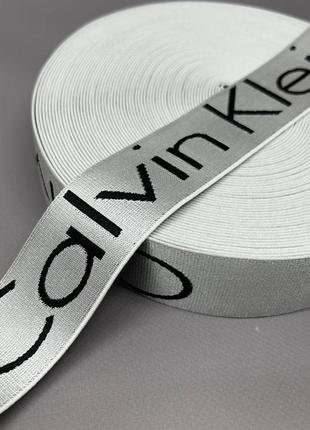 Резинка на відріз брендована ck 4 см - атлас срібло