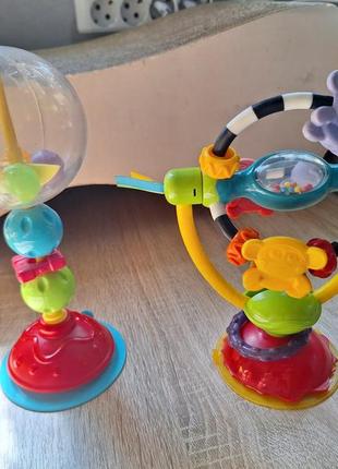 Развивающие игрушки playgro на стульчик с присосками