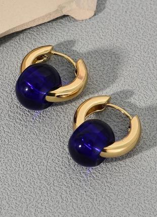 Тренд стильні золотисті сережки кульчики пусети кільця підвіси сині намистини