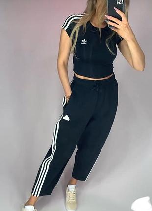 Спортивні штани чорні з лампасами adidas4 фото