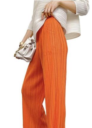 Гарні штани широкі палаццо помаранчеві гофре м 10