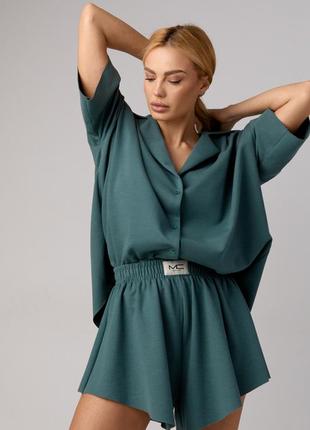 Трикотажный костюм с шортами клеш и рубашкой oversize