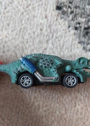 Машинка динозавр