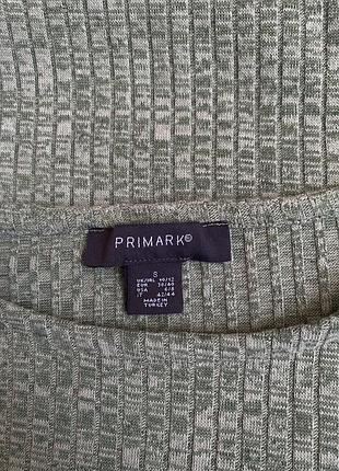 Удлиненный топ с разрезами