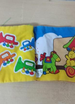 Мягкая яркая книжечка с грызунком для малышей