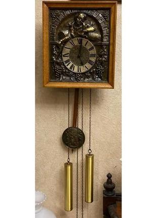 Настенные часы с маятником.2 фото