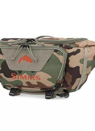 Сумка simms tributary hip pack woodland camo