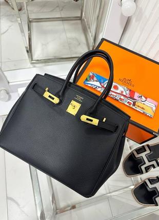 Чорна шкіряна сумка в стилі hermes