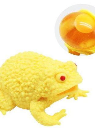 Іграшка-антистрес "жабка з яйцем", жовта
