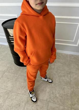 Оранжевый детский спортивный костюм.29-001