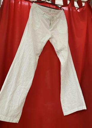 Широкие льняные белые брюки женские