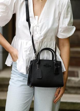 Шикарная молодежная сумка coach в черном цвете прочная кожа в премиум качестве на молнии, среднего размера