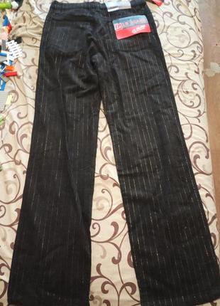 Женские черные джинсы в тонкую полоска