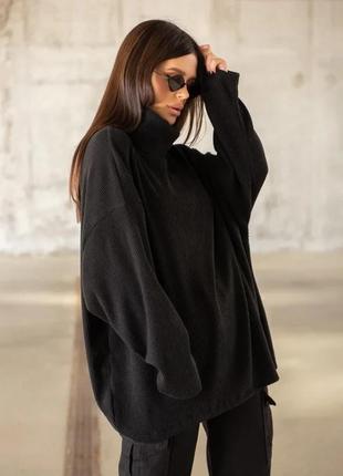 Чорний вільний светр із хомутом розмір l