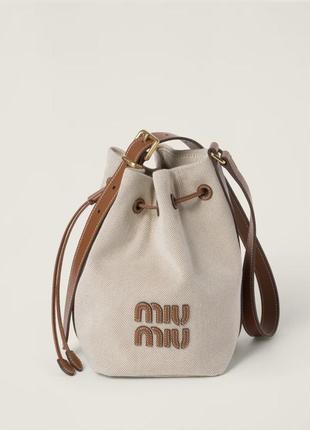 Сумка летняя в стиле miu miu canvas and leather bucket bag