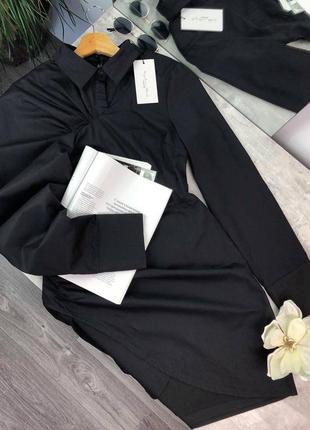 Нарядне чорне плаття з об'ємними довгими рукавами з коміром