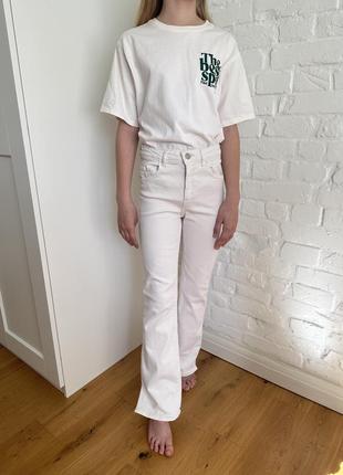 Нові з біркою білі джинси з розрізами