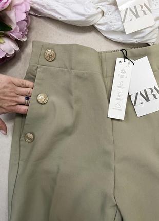 Стильні красиві брюки штани zara з декоративними золотистими ґудзиками по бокам .6 фото