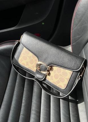Жіноча чорно-коричнева сумка типу coach