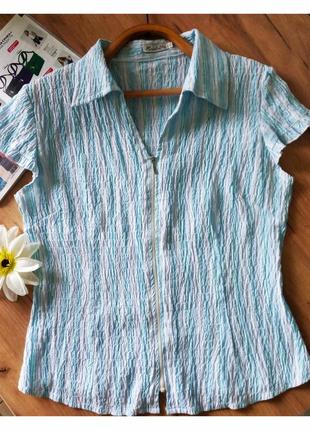 Распродажа легкая летняя женская блузочка.
застежка молния.
тканина жатка.
производитель китай