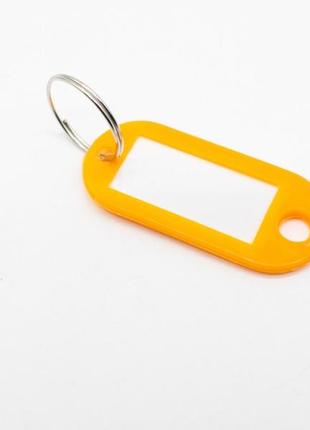 Бирка для ключів. колір оранж. 50мм1 фото