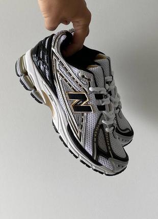 Жіночі кросівки в стилі new balance 1906r gold/black.1 фото