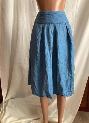 Жіноча спідниця блакитного кольору з кишенями та поясом