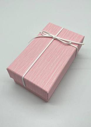Коробка подарункова прямокутна. колір рожевий. 9х15х6см.1 фото