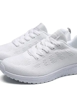 Кросівки білі жіночі