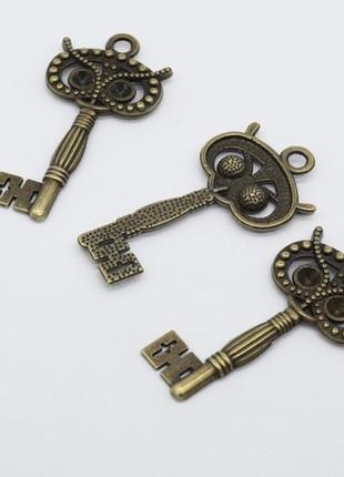 Ключики з металу для декору 60х30 мм товари для рукоділля та творчості1 фото