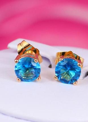 Серьги гвоздики xuping jewelry  с голубым камнем четыре крепления 7 мм золотистые